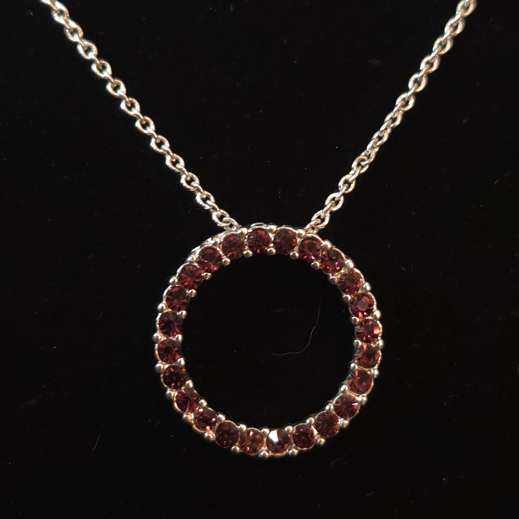 SHB Silver-Tone Red Rhinestone Circle Pendant Necklace