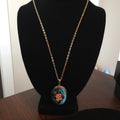 Vintage gold-tone enameled floral and rose design locket