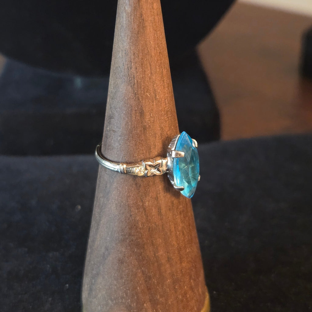 Silver Plated with large blue stone